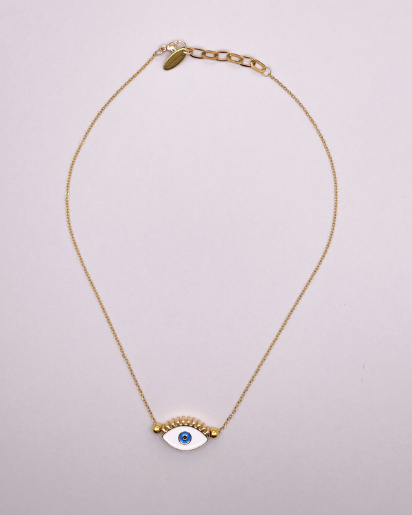 White eye amulet