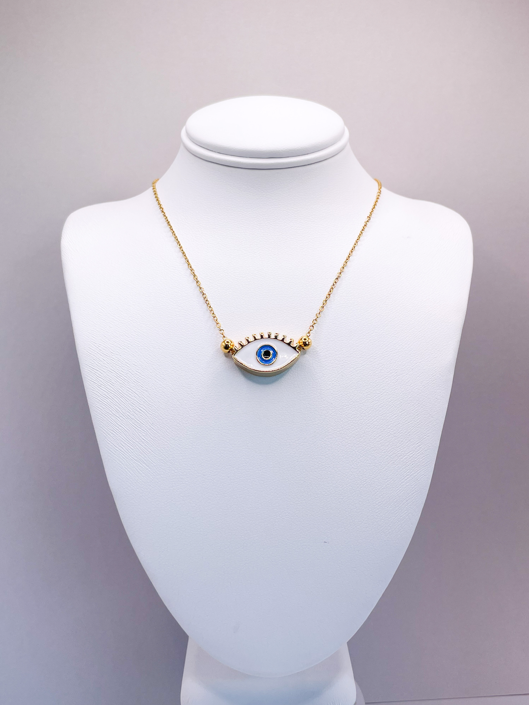 White eye amulet